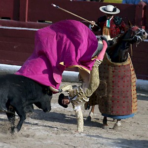 A torrero comes face to face with el toro at the Plaza de Toros bullring in Merida. <a href=></a>