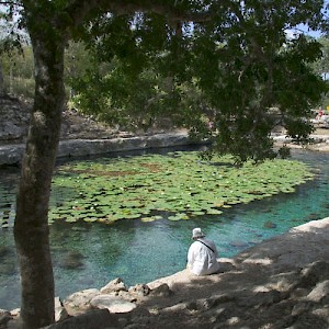 Relaxing at the cenote near the Mayan Archaeological Site of Dzibilchaltun. <a href=></a>