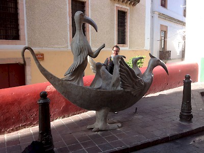 Granddaughter Elise with a street sculpture <a href=></a>